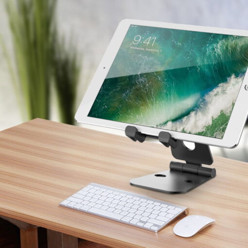 This Is A Product Image Of The Black Universal Tablet And Phone Holder